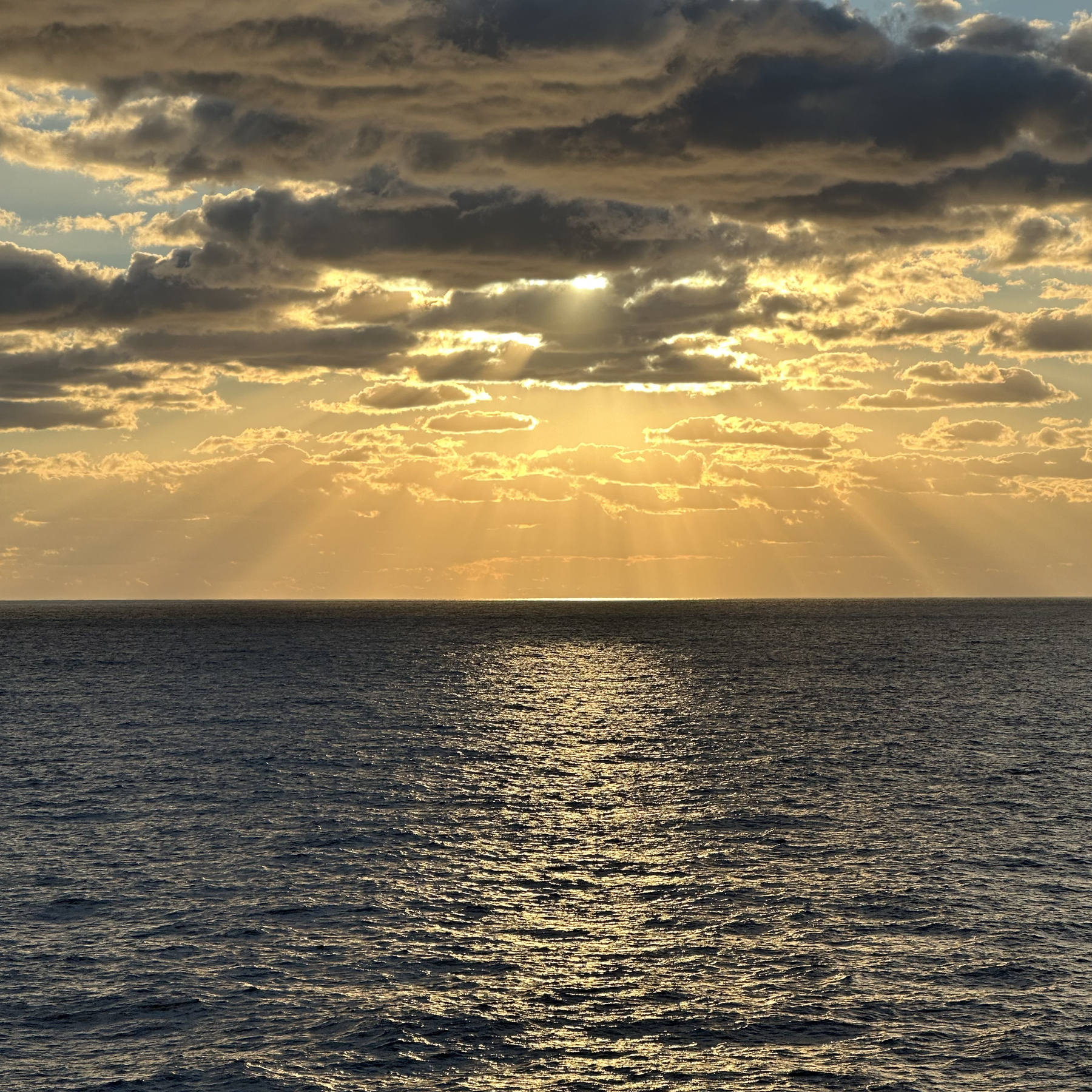 Photo of the sunrise from our cruise ship balcony