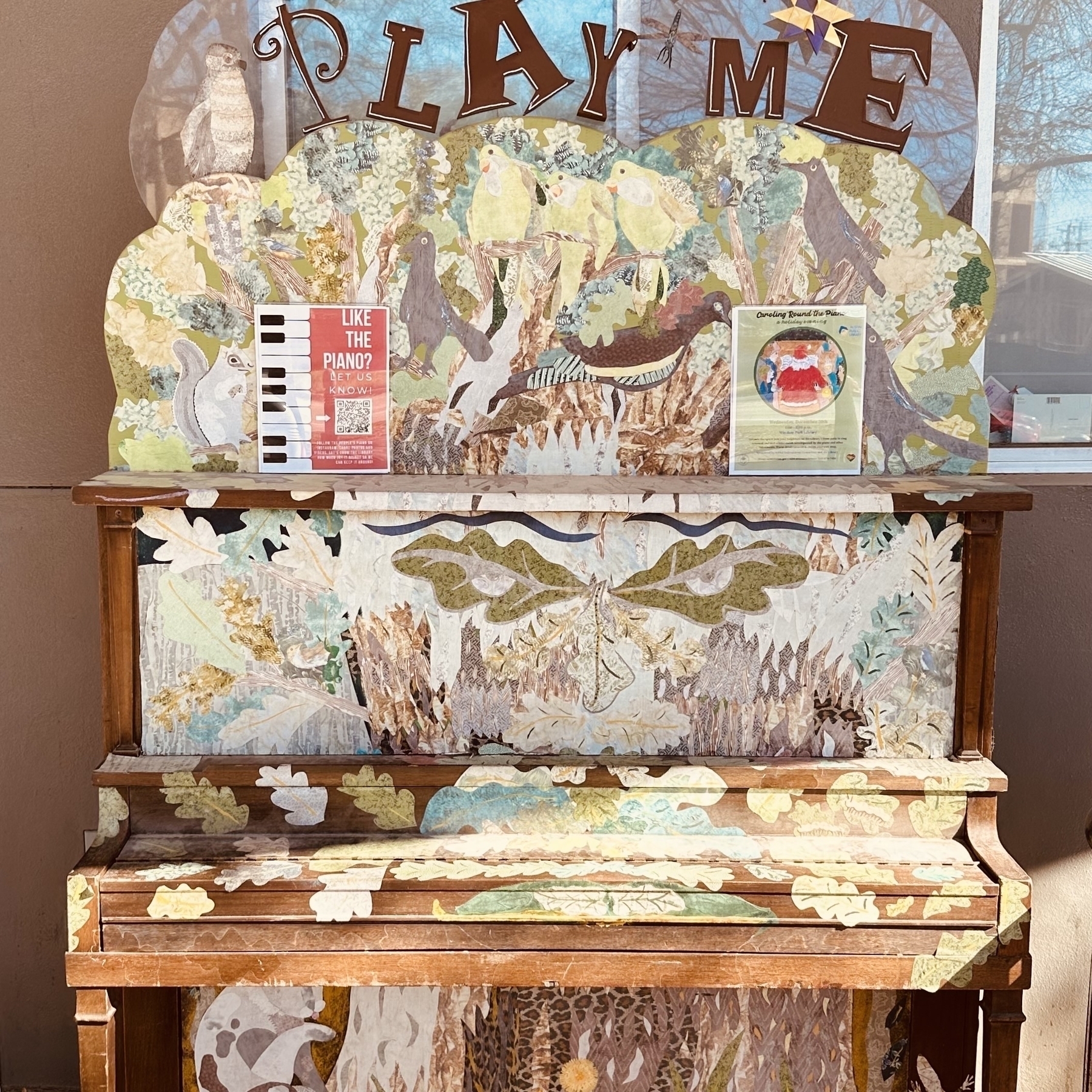 Old piano, painted with green leaves.