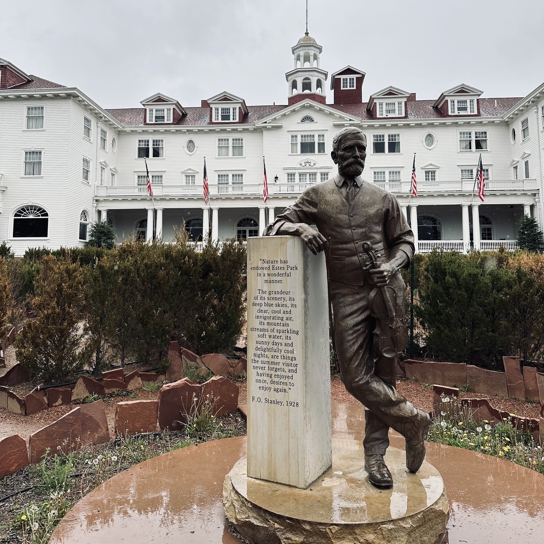 Statue of Stanley and hotel in background.