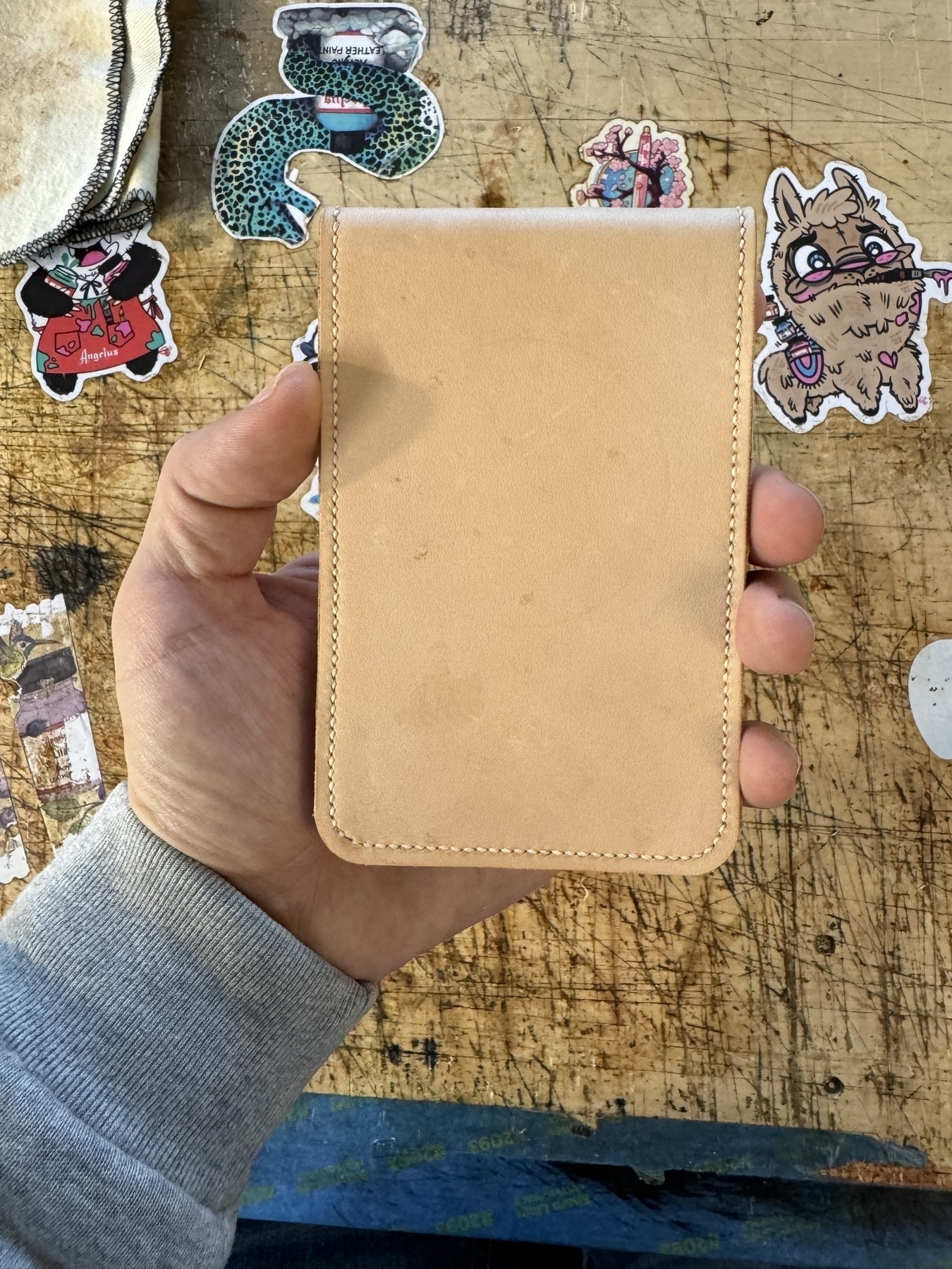 Leather notepad case shown closed