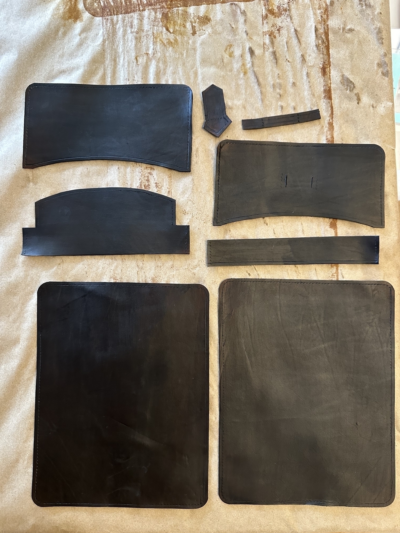 dyed leather, chocolate leather dye, various parts of a leather wallet