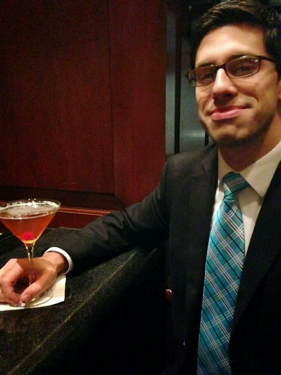 me sitting at my favorite hotel lounge, manhattan cocktail on the bar.