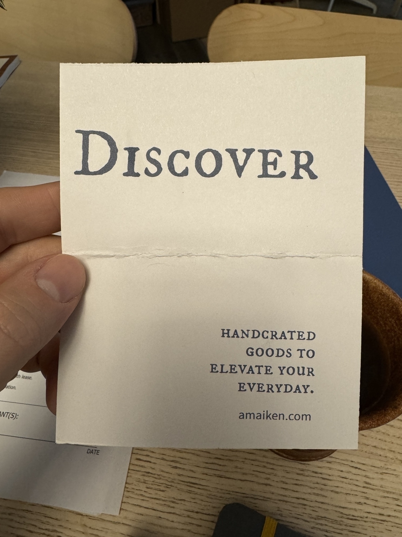 New branding message for A. M. Aiken - on a notecard, it says, Discover handcrafted food to elevate your everyday. Amaiken.com. 
