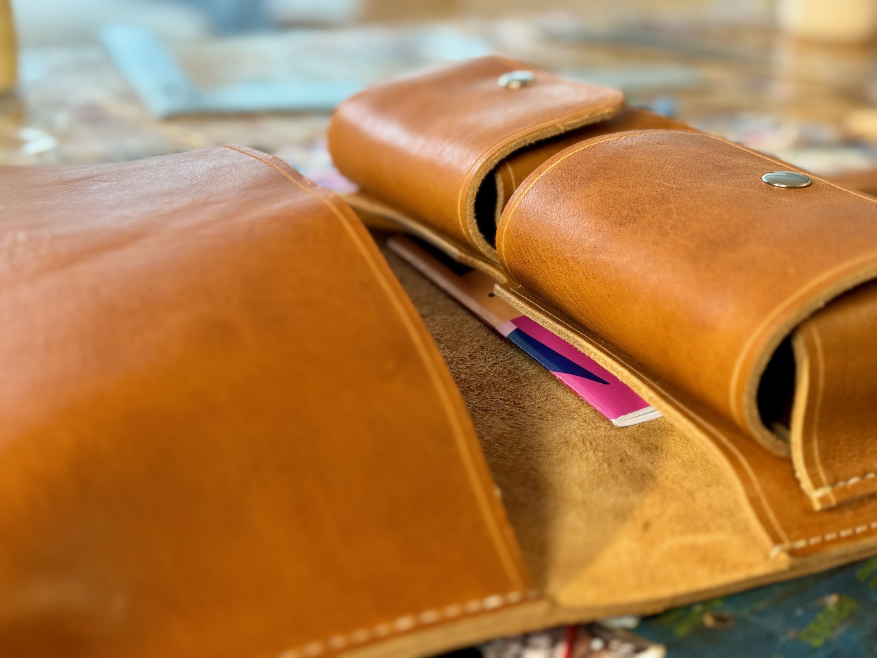 Field Notes notebook stowed in inner pocket of leather cigar case