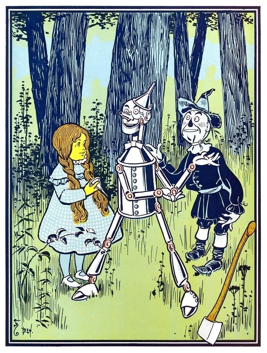 Illustration of three characters in a forest setting. On the left, a girl with long, braided hair wearing a blue dress adorned with a pattern of black birds. In the center, a metallic figure, resembling a humanoid robot with a cylindrical body and limbs. On the right, a figure with a straw hat and patched clothing. An axe lies on the ground nearby. The background features tall trees and green foliage.