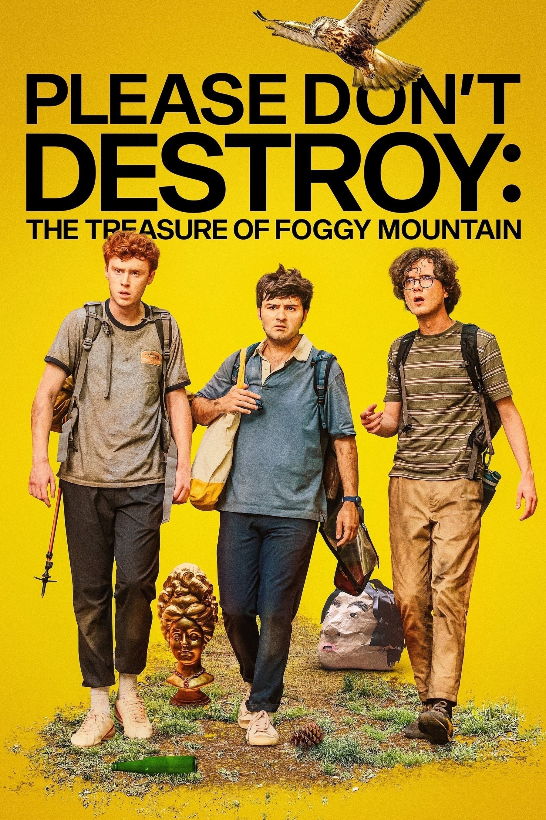 Movie poster for Please Don’t Destroy: The Treasure of Foggy Mountain. The image features three young men wearing backpacks and hiking gear, standing on a patch of grass with scattered objects, including a gold bust and a paper mache mask. The background is bright yellow, and a hawk is flying overhead. The title is in bold black letters at the top of the image.