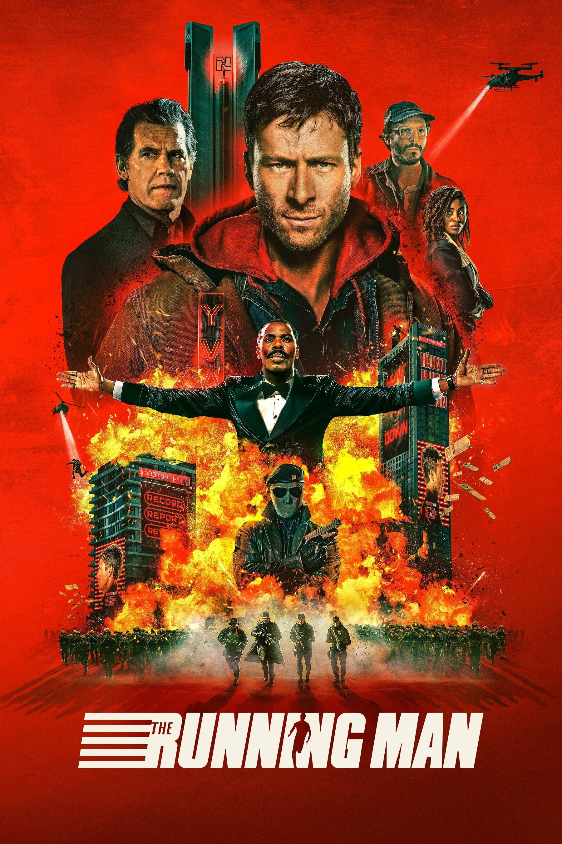 A vivid, action-packed movie poster for "The Running Man" featuring a central figure in a red hoodie surrounded by multiple characters and explosive imagery. The background is a bold red with urban elements like tall buildings on fire and a drone in the sky. At the bottom, figures in uniform are running toward the foreground. The title "The Running Man" is prominently displayed at the bottom in white text with stylized lines.