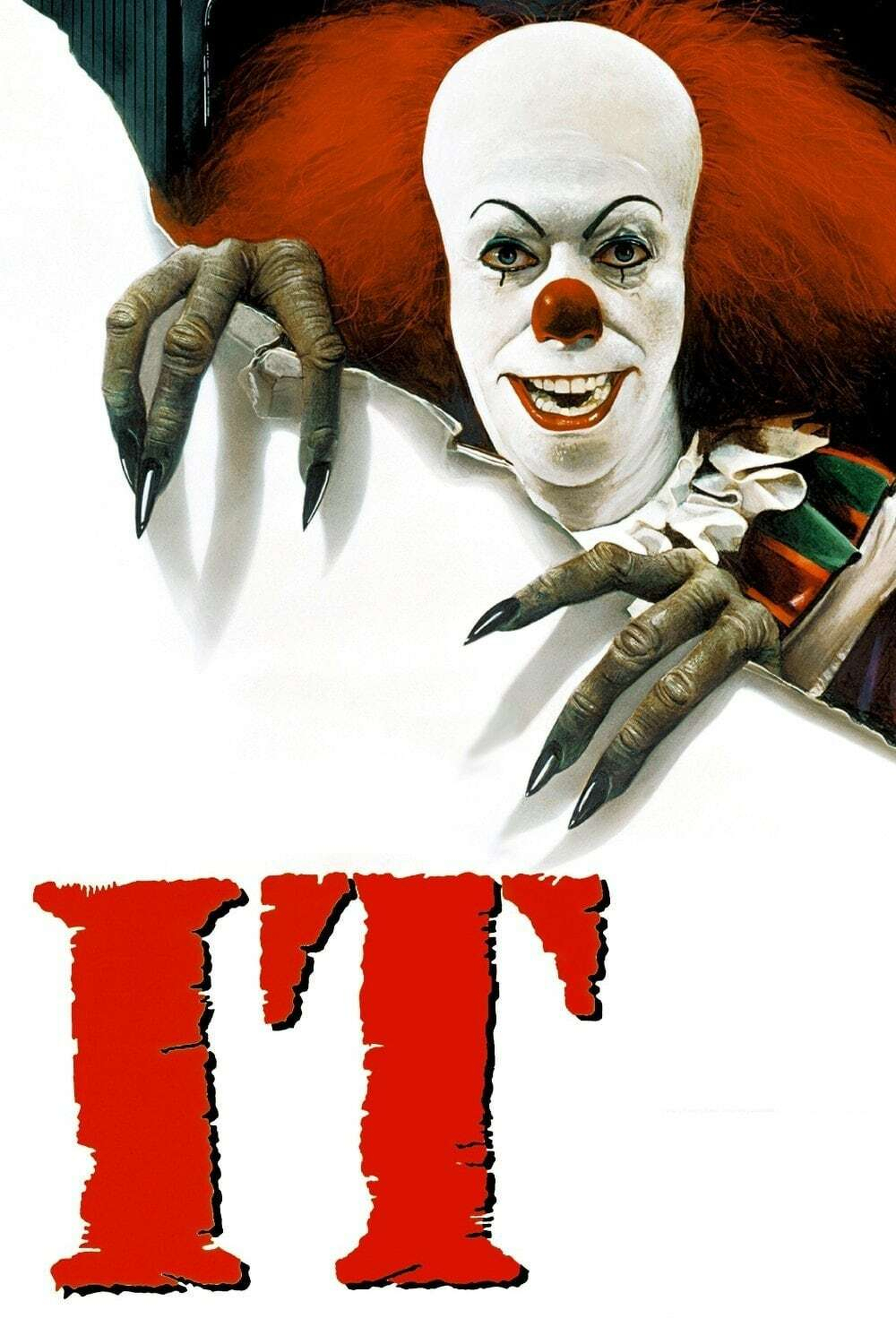A creepy clown with red hair and sharp teeth is peering over a white surface, extending long, clawed fingers. Below the clown, the word "IT" is prominently displayed in large, jagged red letters.