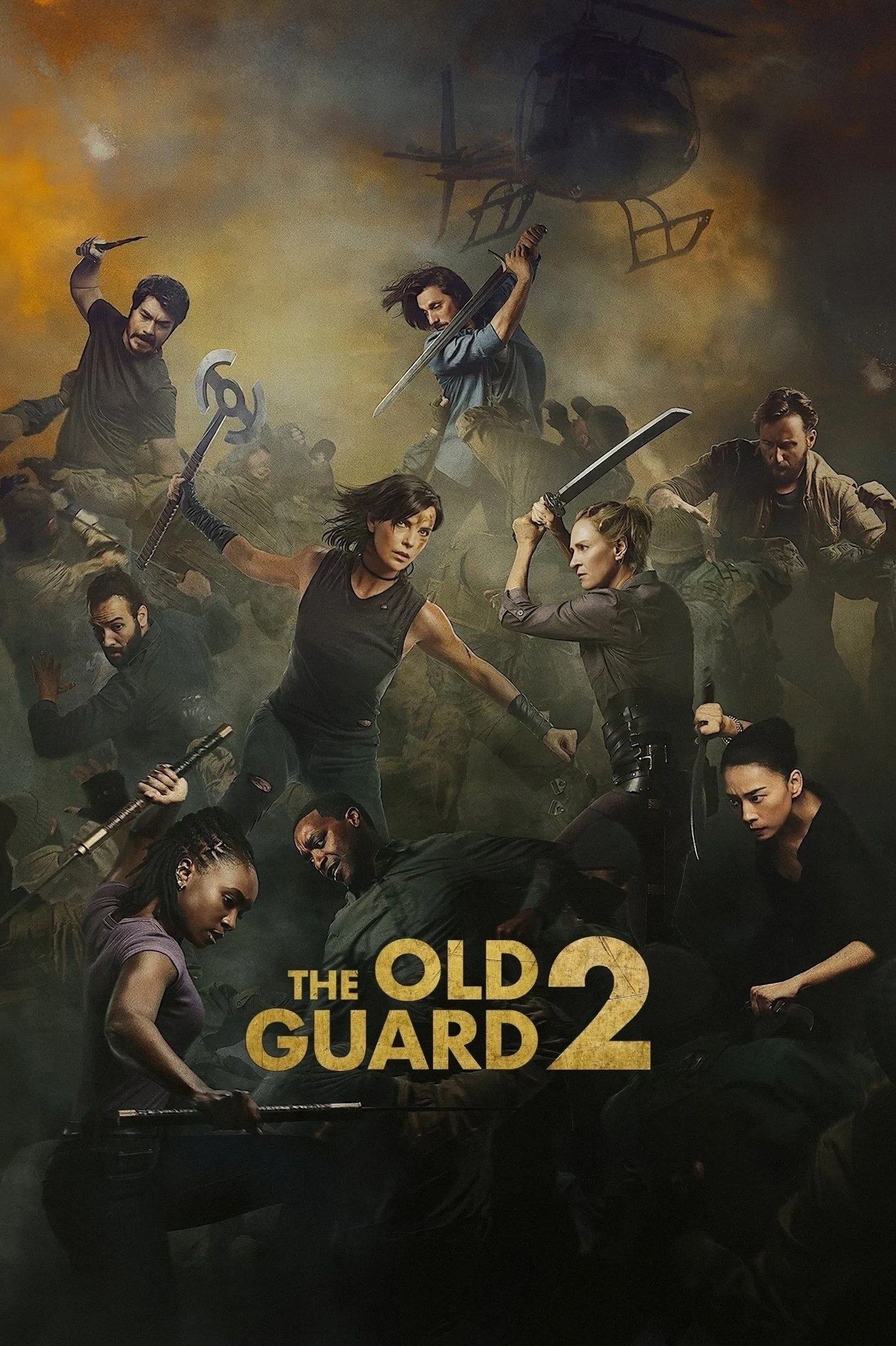 Poster for "The Old Guard 2" featuring a group of characters in dynamic fighting poses, wielding various weapons. A helicopter is visible in the smoky sky above, and the title is prominently displayed at the bottom. The scene conveys action and intensity.