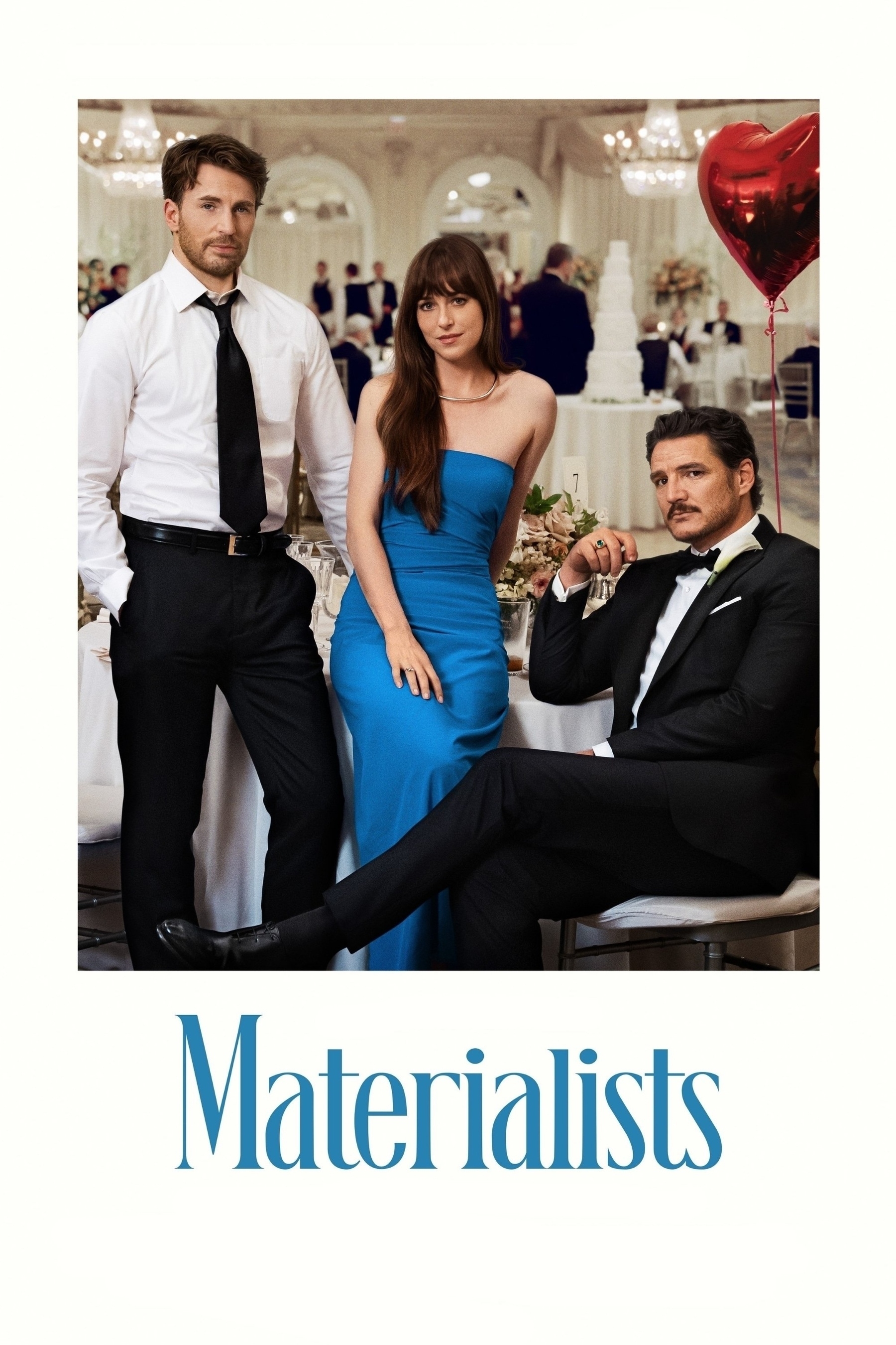 Three well-dressed people are posing in a formal event setting. A man in a white shirt and black tie stands on the left with his hands in his pockets. A woman in a blue dress stands in the middle. A man in a black suit sits on a chair on the right, holding a drink. There is a large white cake in the blurred background, and red heart-shaped balloons to the right. The word "Materialists" is written at the bottom.