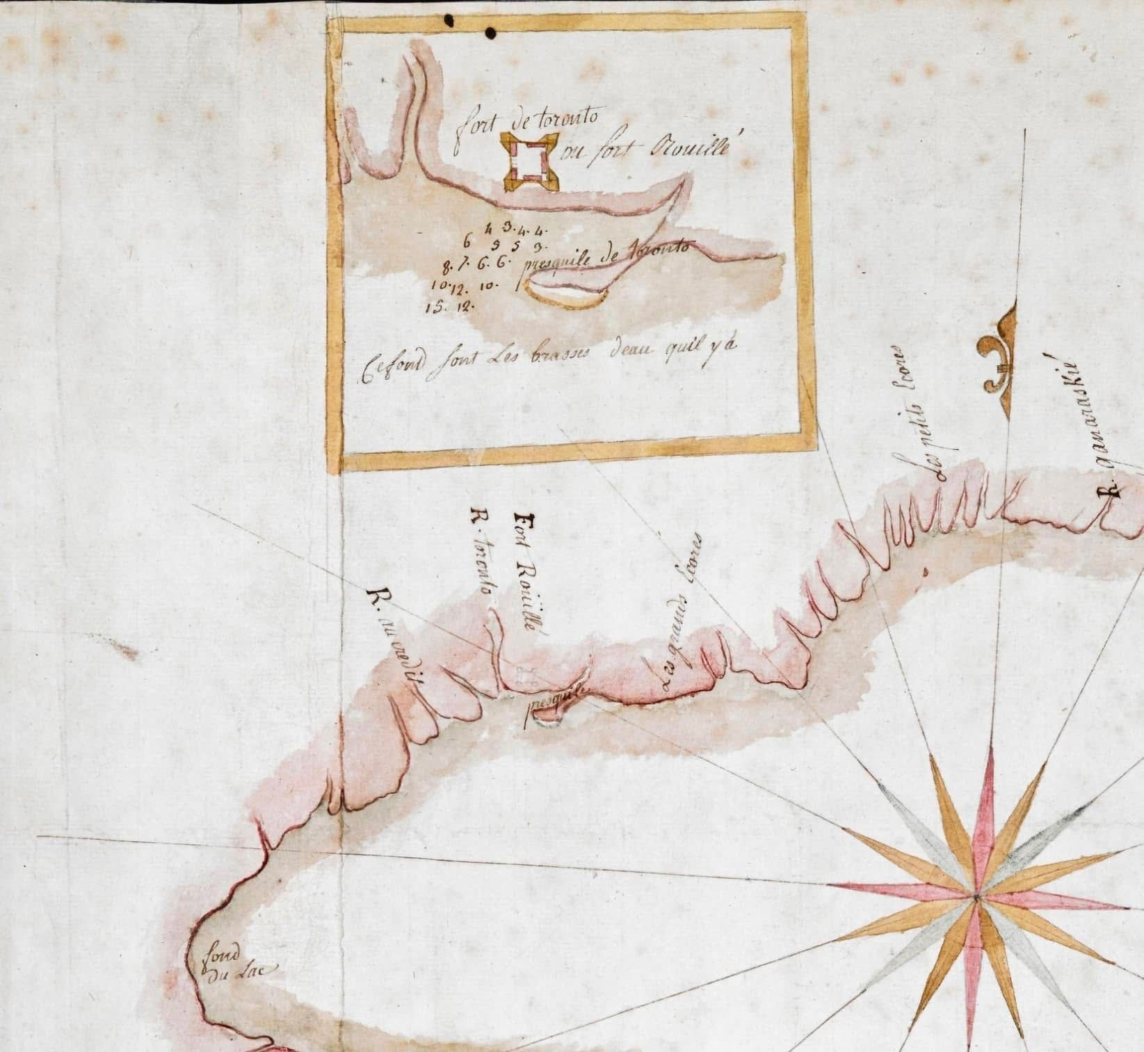 A historical hand-drawn map with faded colours, primarily in soft pink, brown, and beige tones. It depicts a coastline with rivers and bays, including a large compass rose in red, yellow, and black at the bottom right, pointing directions. In the top left, an inset map shows a small fort labelled “Fort de Toronto ou fort Rouillé,” drawn as a simple square structure with bastions along a curving shoreline. The inset also includes a series of numbers and the phrase “pequinite de Toronto,” along with a note about water depth. The main map labels several rivers, including “R. Toronto” and “R. naumaviin,” a location marked “Fort Rouillé,” and the “les grands bois” along the shore. The coastline is shaded pink, with sketched trees or hills indicating terrain, and the water areas are left mostly blank except for key markings. The bottom left corner of the map is labelled “Fond du Lac.”