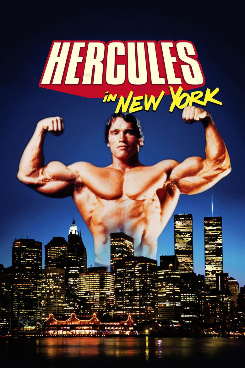 A movie poster features a muscular man posing shirtless with his arms flexed in a double biceps pose, towering over the illuminated New York City skyline at night. The Twin Towers of the World Trade Center and other skyscrapers are visible with their lights glowing against a dark blue sky. Above the man, the title appears in bold lettering: “HERCULES” in large red and white text, with “in NEW YORK” written below it in yellow, stylized handwriting. The overall colour palette contrasts the brightly lit city with the deep evening sky and the figure’s tanned, highlighted muscles.
