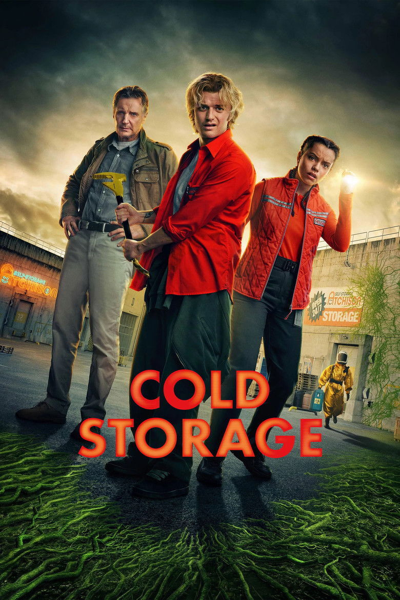 A movie poster for *Cold Storage* showing three people standing in a storage facility lot under a dramatic, cloudy sky lit with warm sunset light. On the left, an older man with graying hair wears an olive-green military-style jacket over a gray shirt, light khaki pants, and a dark belt. He stands with one hand on his hip and holds a yellow pry bar. In the center, a young man with wavy blond hair wears a bright red button-up shirt with the sleeves rolled up, dark green pants, and dark sneakers. He looks alarmed and grips the yellow tool. On the right, a young woman with dark hair pulled back wears a red quilted vest with reflective stripes over a red long-sleeve top and dark pants. She raises a glowing flashlight and looks anxious. In the background, a figure in a yellow hazmat suit and helmet runs toward a doorway. Neon and painted signs on the buildings read "Self-Storage" and "Atchison Storage," and one sign includes an "Open Daily" starburst. The ground is covered with glowing green tendrils, and a teal canister sits near the doorway. Large red-orange block letters across the lower center read "COLD STORAGE."