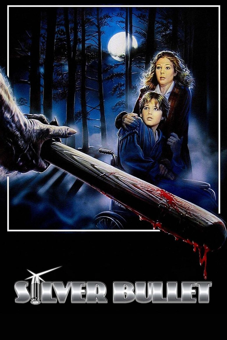 A horror movie poster depicts a dark, eerie forest under a full moon, with tall, shadowy trees in the background. In the foreground, a werewolf’s clawed hand grips a bloodied wooden bat that drips red. A frightened young boy in a wheelchair clutches a woman who protectively embraces him, both staring in shock toward the creature. The scene is framed with a white border, and at the bottom, large metallic letters spell out “SILVER BULLET,” with the “I” represented by a silver bullet.