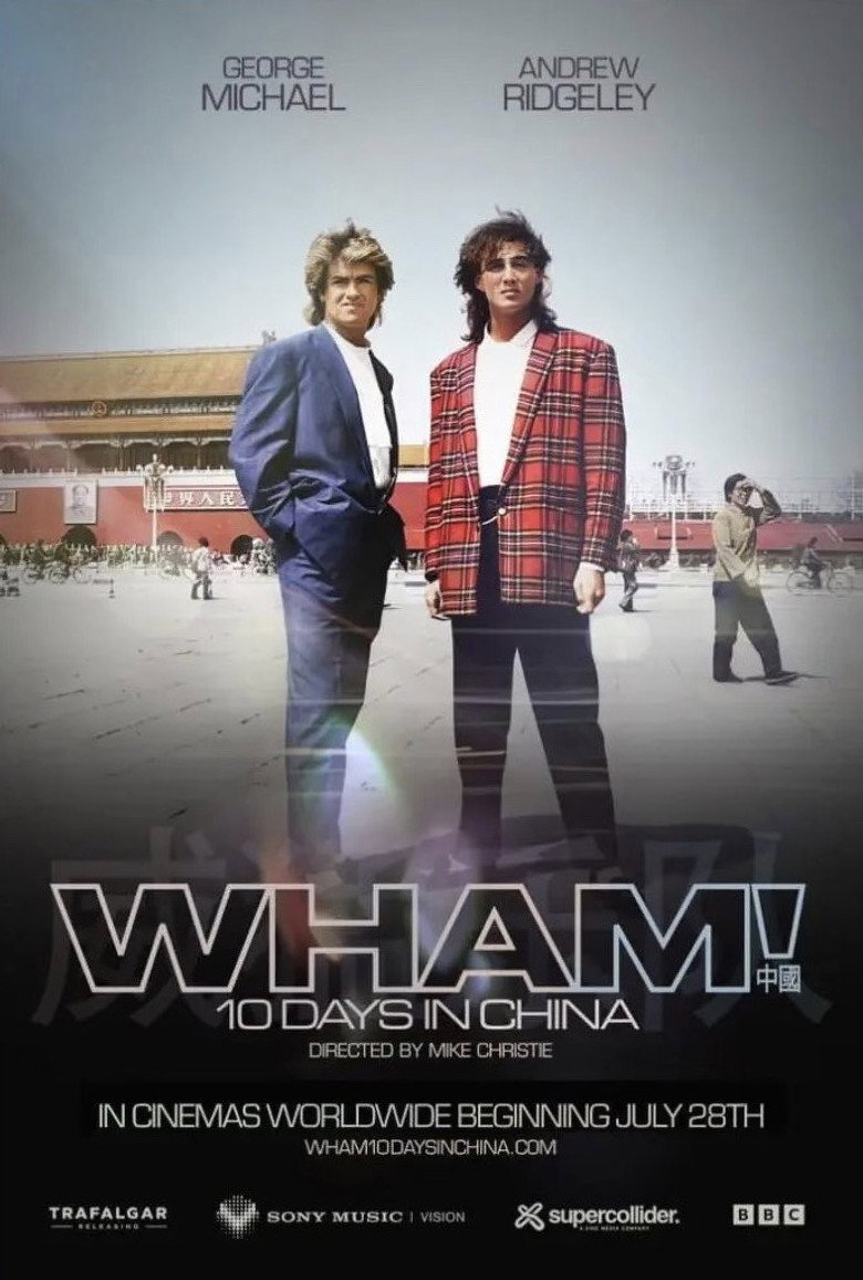 A promotional poster featuring two men standing in front of the Tiananmen Gate in Beijing, China. The man on the left is wearing a blue suit with a white shirt and black tie, with his hands in his pockets. The man on the right is wearing a red plaid blazer over a white turtleneck, with black pants, and has long hair. Both are looking confidently toward the camera. In the background, people are walking and riding bicycles near the large red walls of the Forbidden City, adorned with Chinese writing and a portrait of Mao Zedong. The sky is clear and blue. The text at the top reads "GEORGE MICHAEL" on the left and "ANDREW RIDGELEY" on the right. Below the image of the men, large text says "WHAM!" followed by "10 DAYS IN CHINA" and "DIRECTED BY MIKE CHRISTIE." Additional text at the bottom reads "IN CINEMAS WORLDWIDE BEGINNING JULY 28TH," along with the website "WHAM10DAYSINCHINA.COM" and logos for Trafalgar Releasing, Sony Music Vision, Supercollider, and BBC.