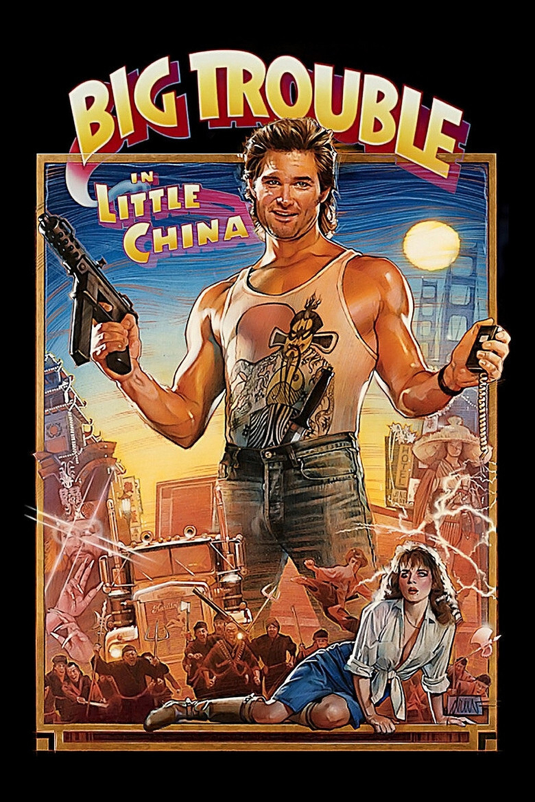 A colourful illustrated movie poster depicts a muscular man in a white tank top with a graphic of a Chinese warrior, holding a gun in his right hand and a knife in his left. He wears blue jeans and has a confident smile. Behind him, a cityscape glows under a full moon with neon lights and a hotel sign. In the background, a large semi-truck, martial artists, and figures in traditional Chinese hats are engaged in action. At his feet, a woman with long brown hair, wearing a white tied blouse and blue skirt, crouches on the ground looking concerned. At the top, large bold letters read “BIG TROUBLE,” with “IN LITTLE CHINA” below in stylized text.