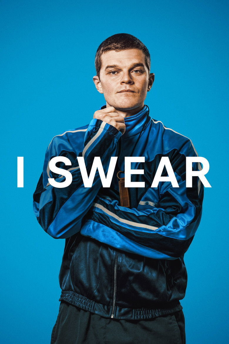 A person wearing a shiny blue and black tracksuit poses against a bright blue background. They have short dark hair and a serious expression, with one hand holding the collar of the tracksuit and the other arm crossed over their chest. Bold white capital letters across the middle of the image read “I SWEAR.”