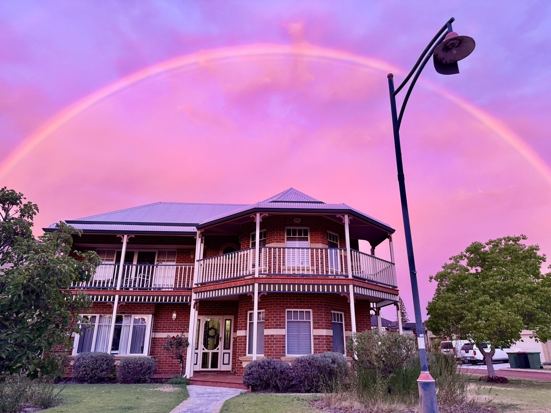 House framed by a rainbow