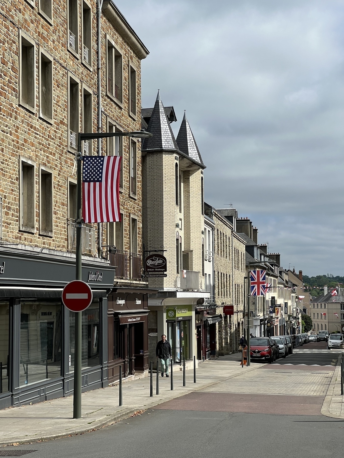 US and UK flags flying in a Normandy town.