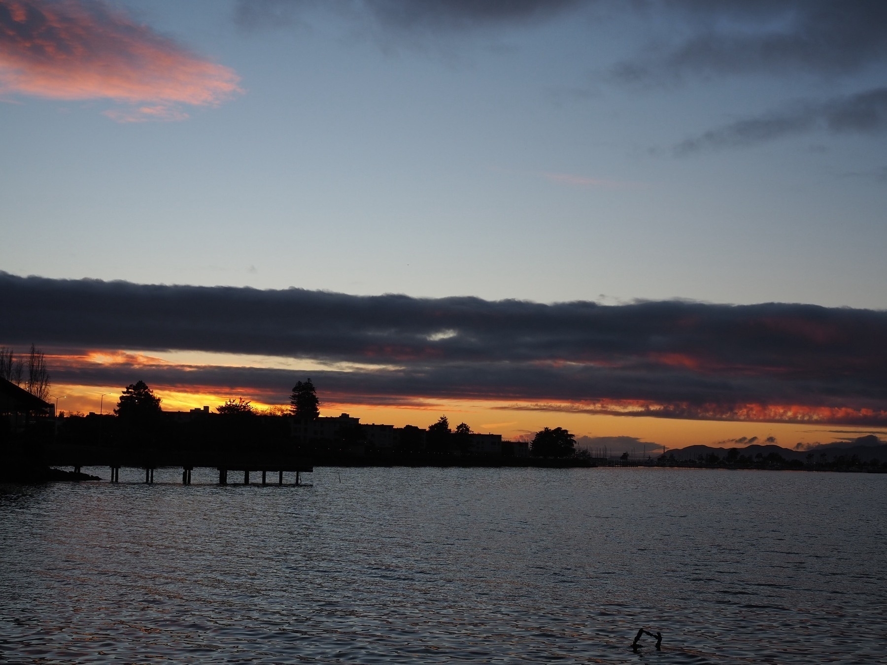 Sunset, looking out from Emeryville at the San Francisco Bay. 