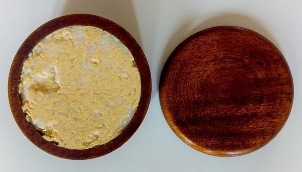 Vintage and modern shaving soaps comined together and pressed into a wooden shaving bowl.
