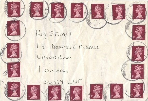 A leaflet with a handwritten address, and no fewer than twenty one-penny postage stamps affixed.