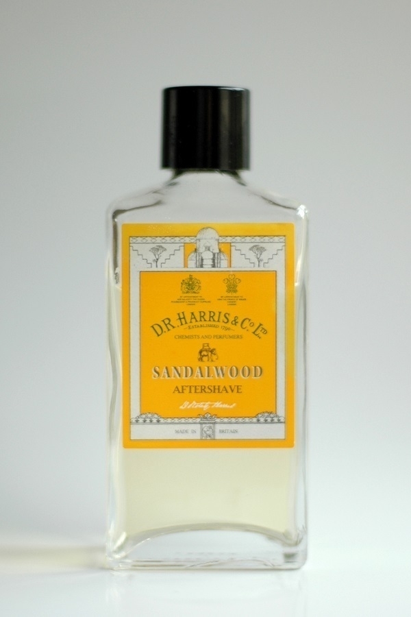 A part-used bottle of D.R. Harris & Co. Ltd's Sandalwood Aftershave.