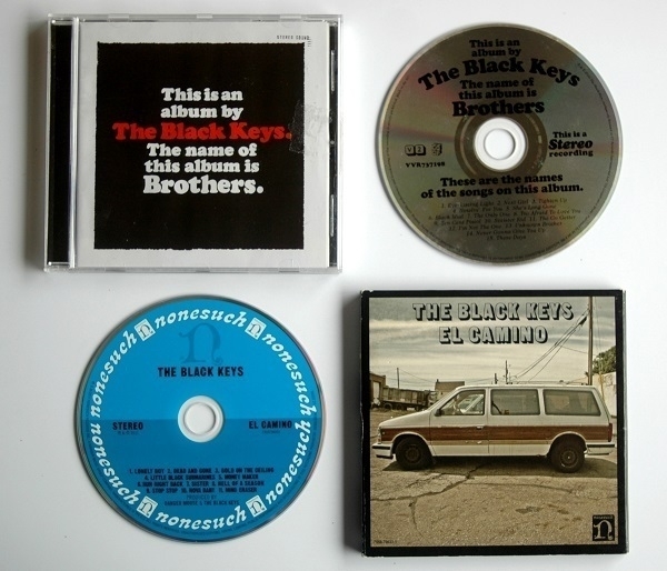 CD copies of the albums 'Brothers' and 'El Camino' by The Black Keys.