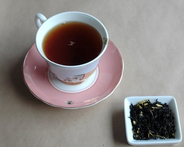 A nice cup of Earl Grey tea and some of the tea leaves.