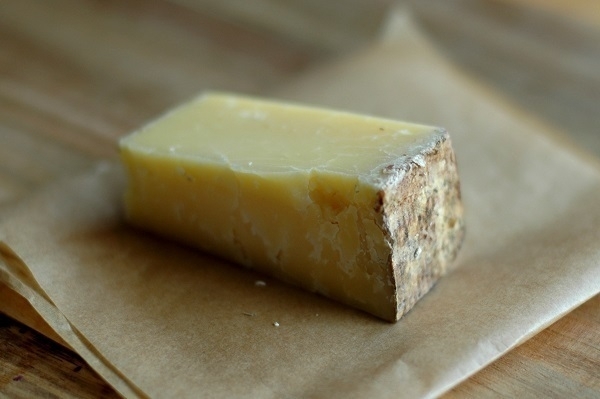 A small piece of 'Lincolnshire Poacher' cheese.