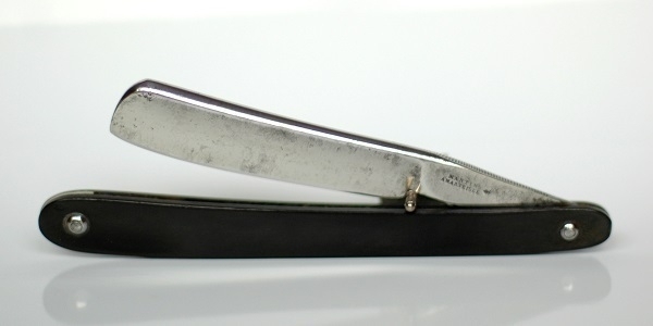 A 19th-century French straight razor stamped 'Martin à Marseille'.