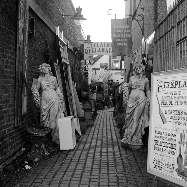 Black and white photo of the entryway to 'Reclaimers Reclamation' in Horfield, Bristol, ca. 2011.