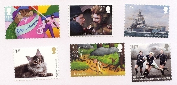 Six assorted, unused special-issue British postage stamps.