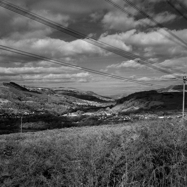 A high-contrast monochrome view of the Cynon Valley in South Wales.