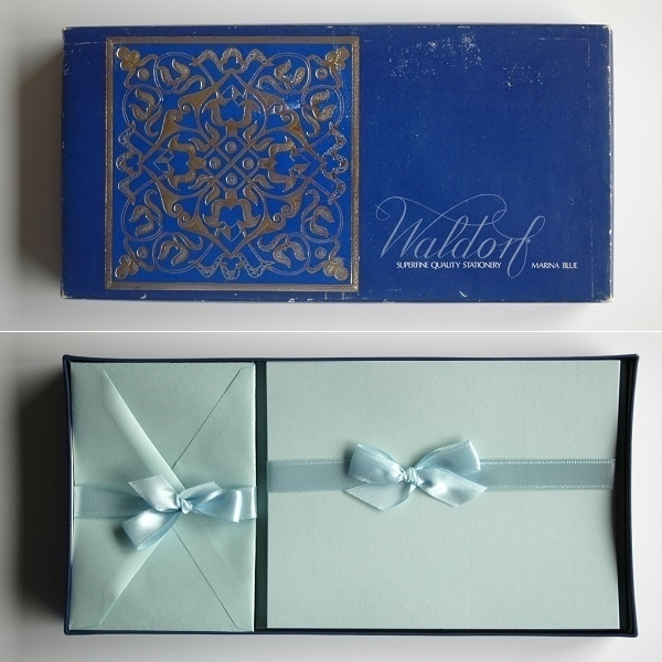 The lid of a box of 'Waldorf'-brand stationery and its contents.