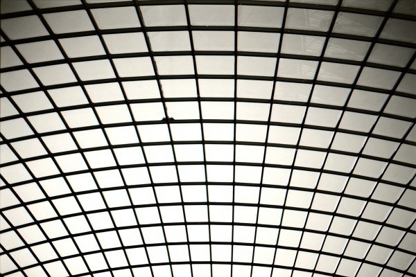 Monochrome photo of a shopping mall skylight. 