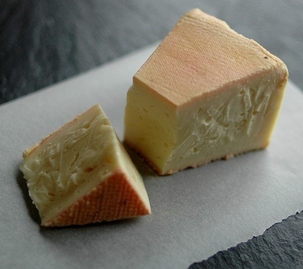 A wedge of 'Stinking Bishop' cheese.