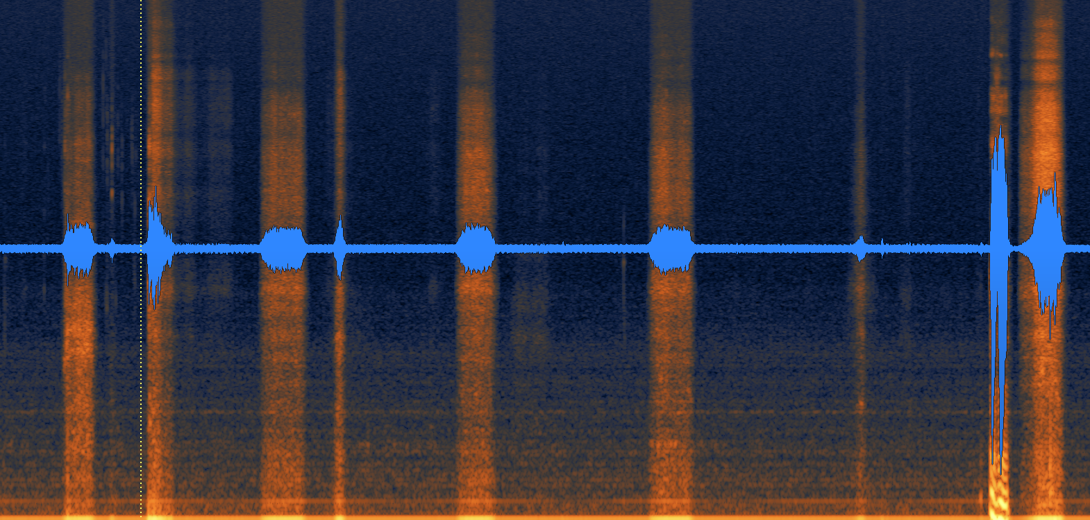 A close up of a waveform from a podcast recording showing little bumps in the audio where a breath likely happened.