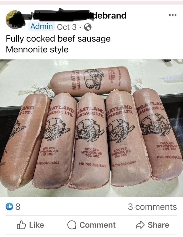 FB post showing sausages wrapped with a caption reading “Fully cocked beef sausage Mennonite style.”