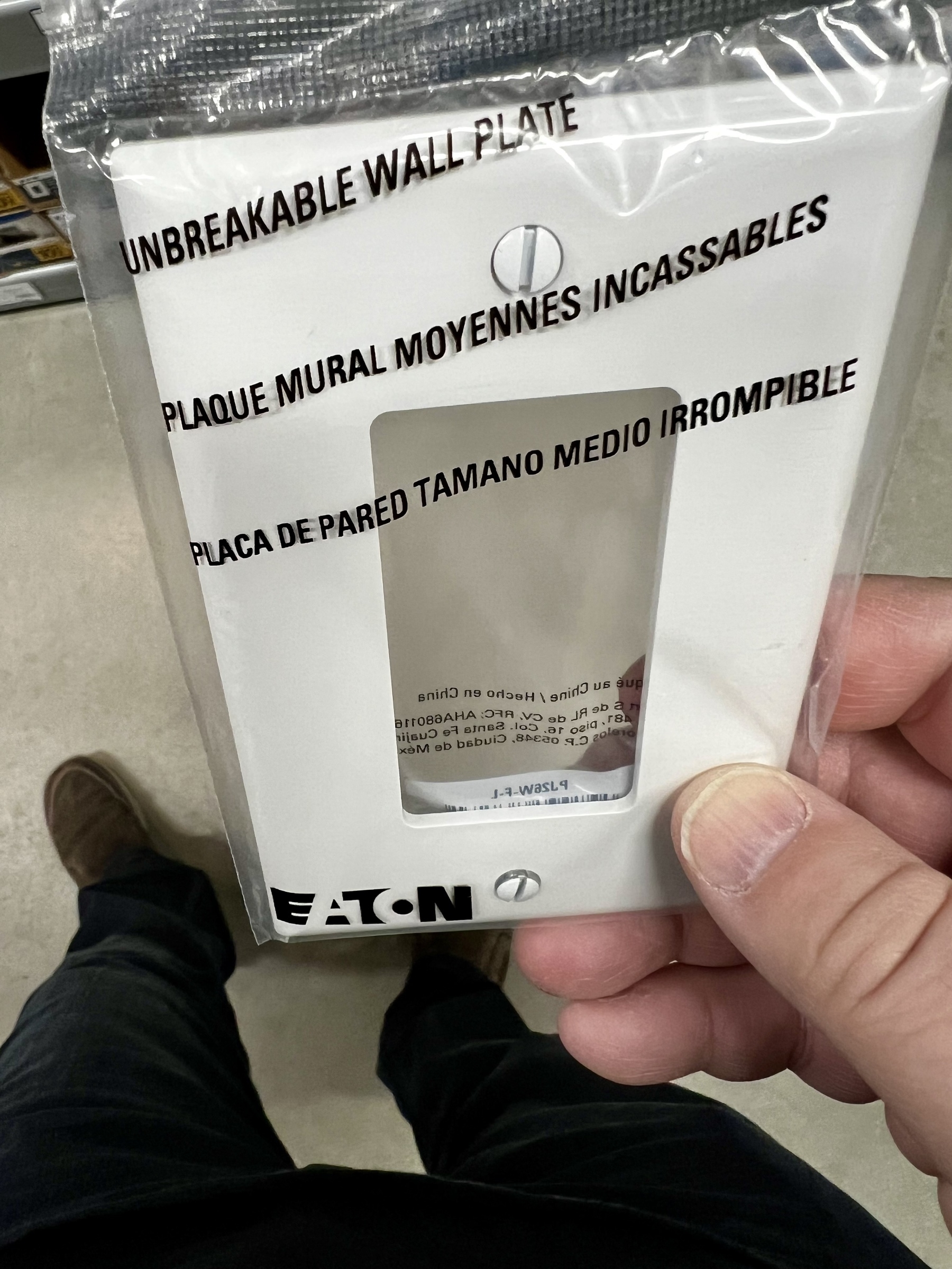 A light switch face plate with “unbreakable” on the packaging.