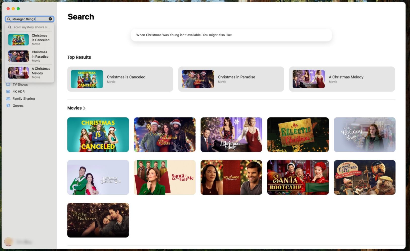 A search results page for holiday-themed movies is displayed, featuring various film titles and thumbnails, including Christmas is Canceled and A Christmas Melody.
