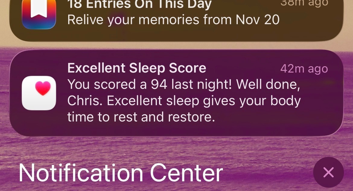 A notification in the Notification Center shows a message congratulating someone named Chris for achieving an excellent sleep score of 94.