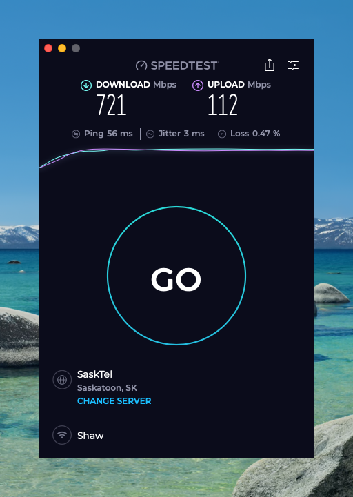 A speed test result shows a download speed of 721 Mbps and an upload speed of 112 Mbps.