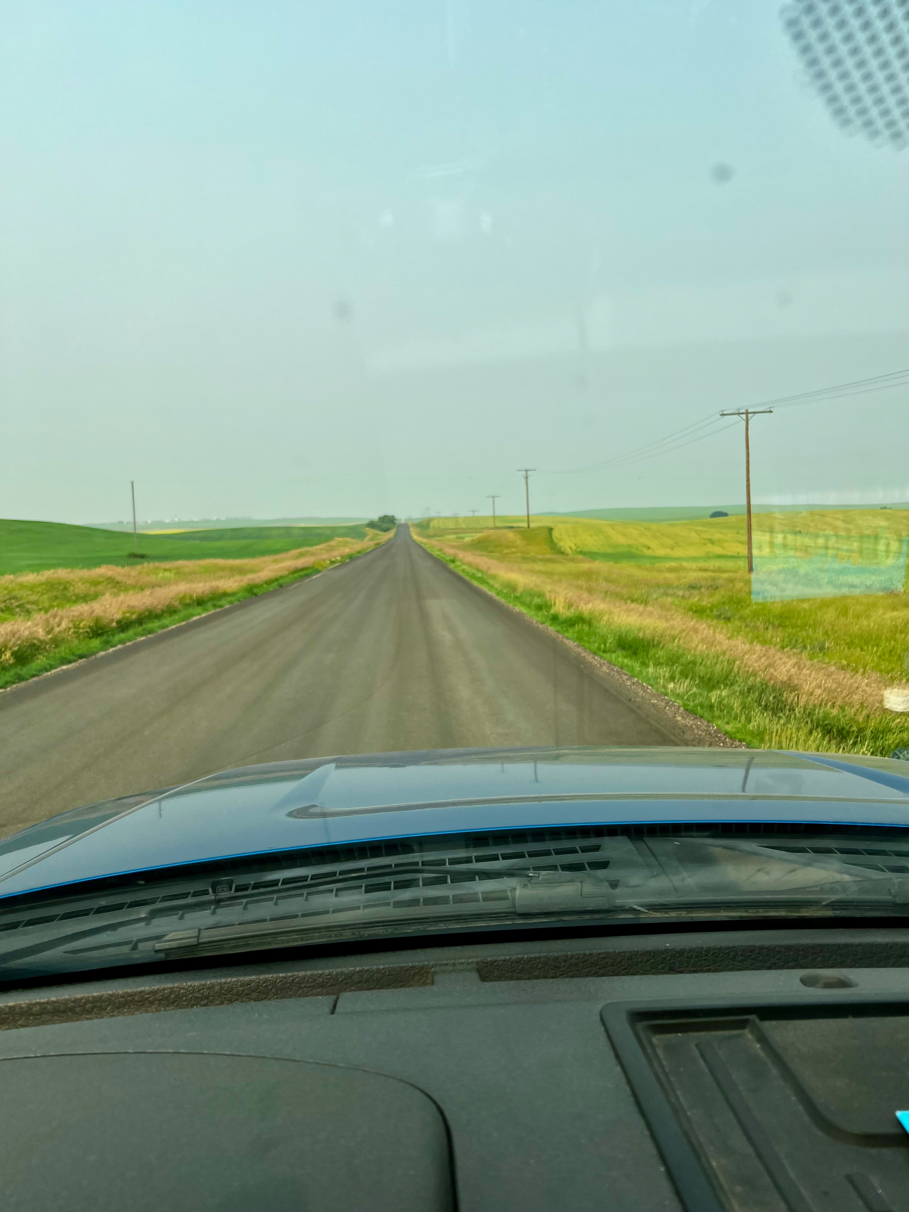 A highway without any dividing lines or shoulder. 