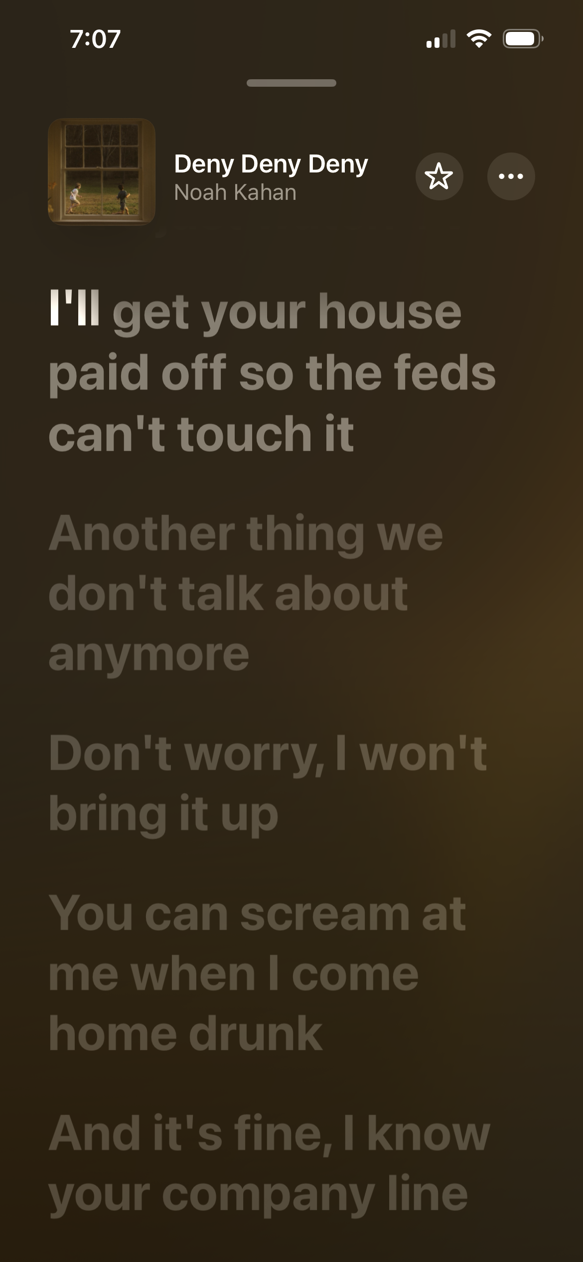 The screenshot shows music lyrics from a song titled Deny Deny Deny by Noah Kahan displayed on a phone screen. I'll get your house paid off so the feds can't touch it&10;Another thing we don't talk about anymore&10;Don't worry, I won't bring it up&10;You can scream at me when I come home drunk&10;And it's fine, I know your company line