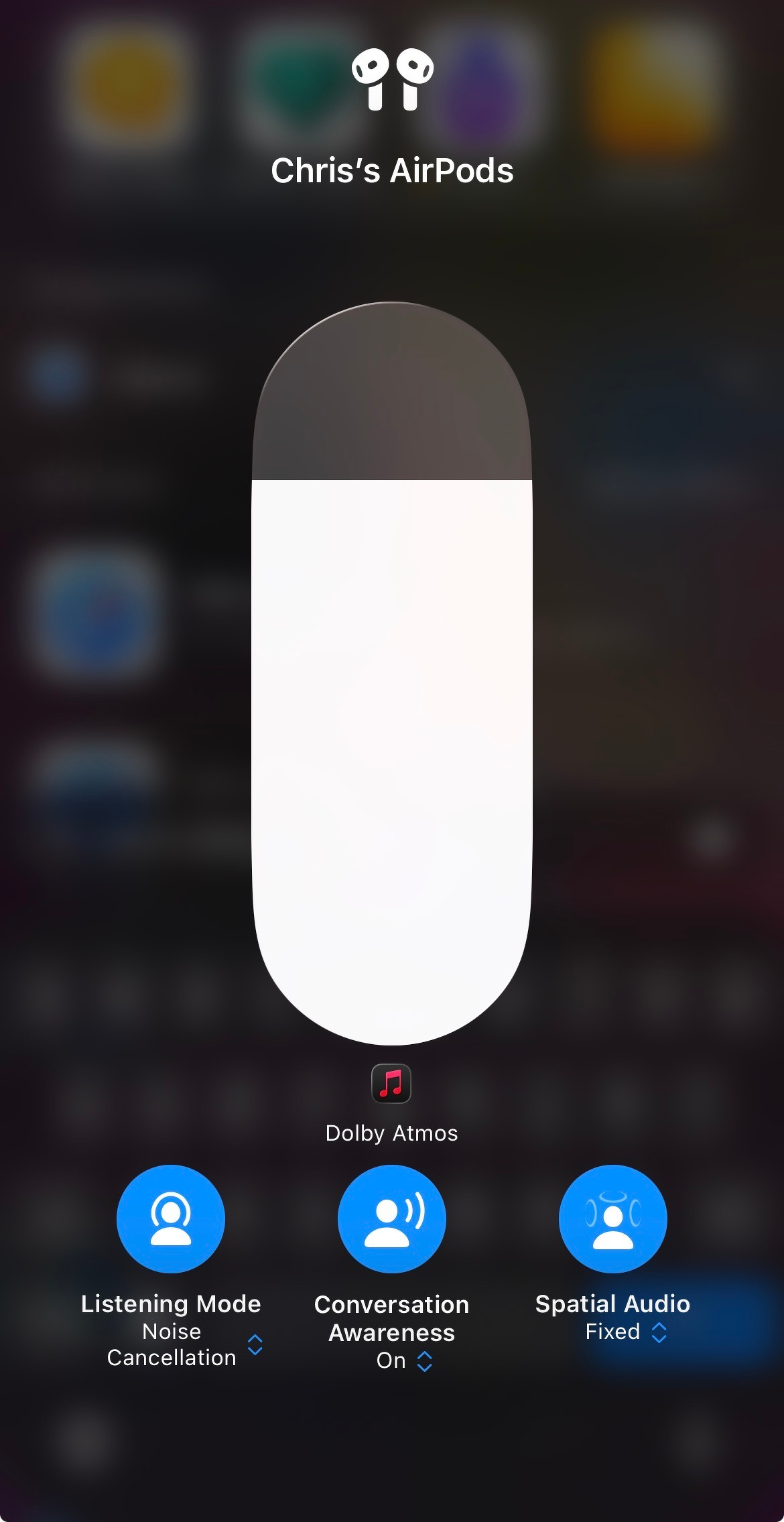 Control options for AirPods are displayed, including Listening Mode, Conversation Awareness, and Spatial Audio, with Dolby Atmos highlighted.