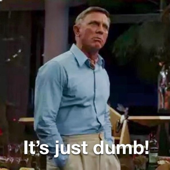 Daniel Craig as Benoit Blanc in a blue shirt and beige pants stands with a serious expression, accompanied by the caption It's just dumb!