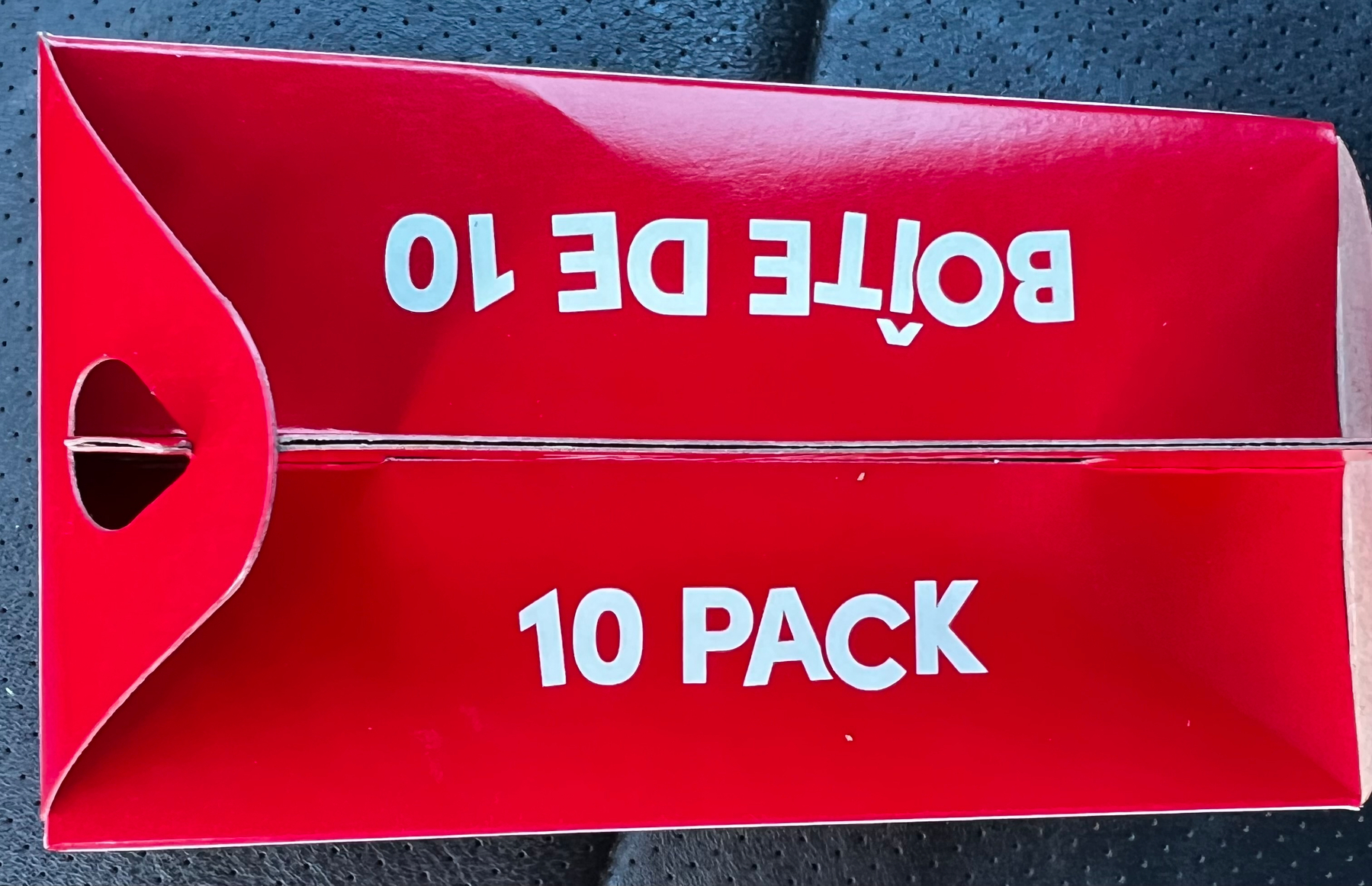 A red box labeled 10 PACK and BOÎTE DE 10 is shown, with the text appearing upside down on one side.