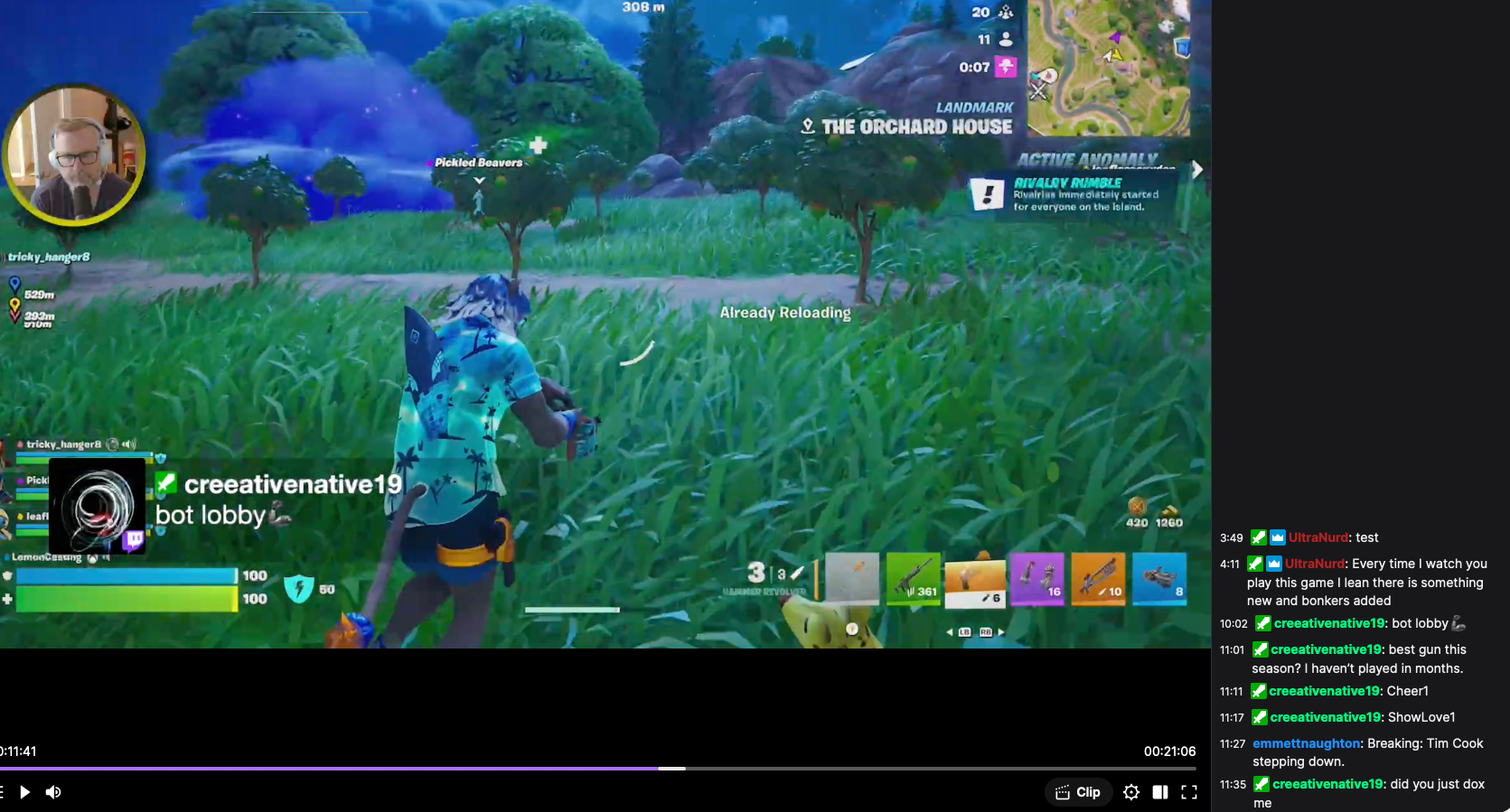 A player in a vibrant outfit is exploring a grassy area in Fortnite while Twitch chat comments are visible on the right.