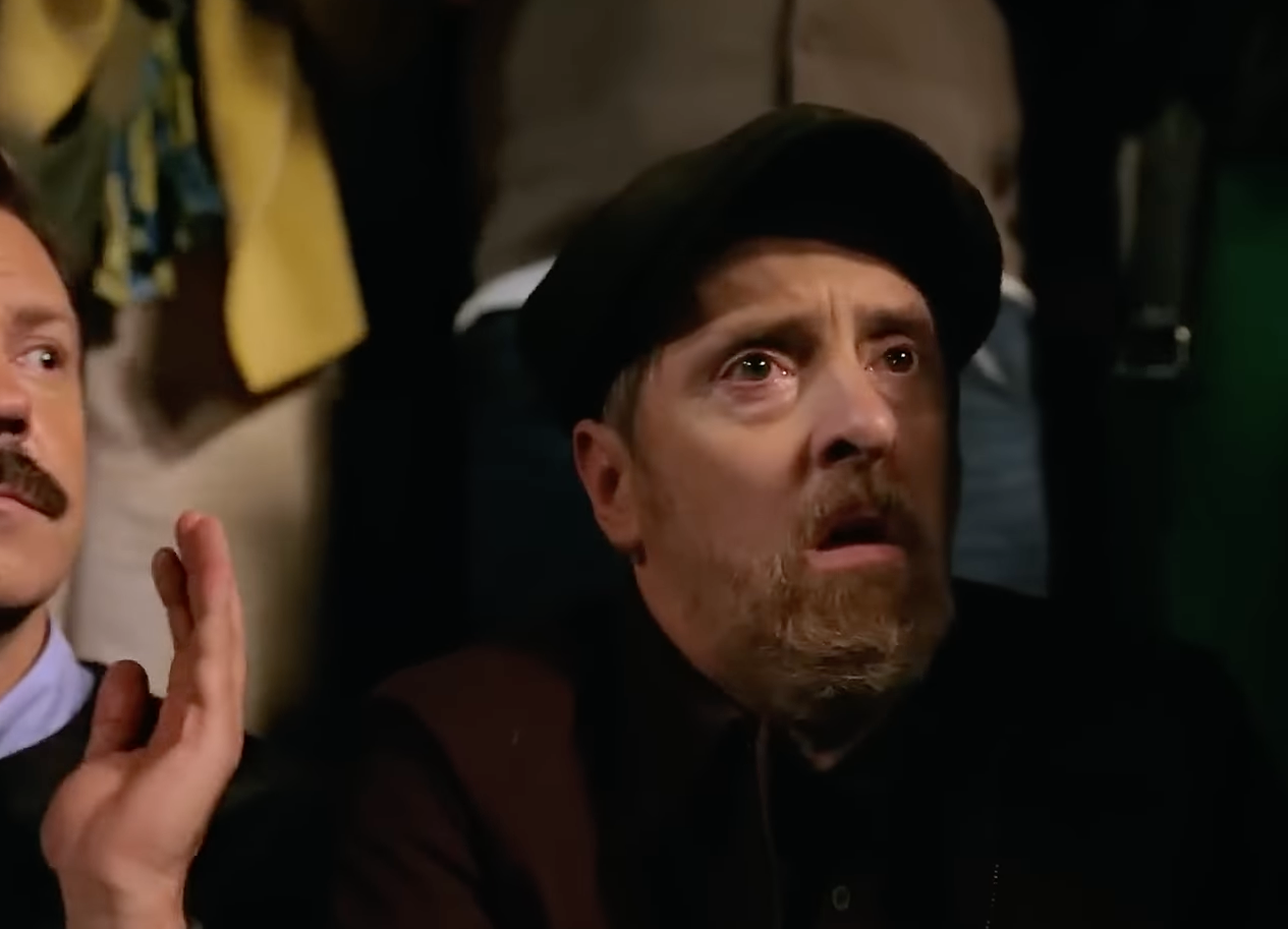 Coach Beard looking sad towards the camera